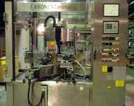 Labelling machine for glass bottles - KRONES - CANMATIC